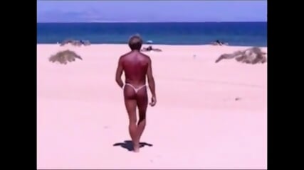Tanned Guy On Beach In Tiny String Thong (Temporarily!) free video